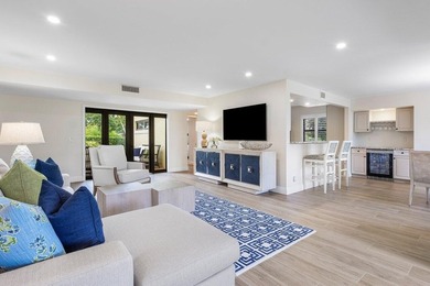 Experience the convenience of this renovated first-floor corner on Quail Ridge Golf Course and Country Club in Florida - for sale on GolfHomes.com, golf home, golf lot