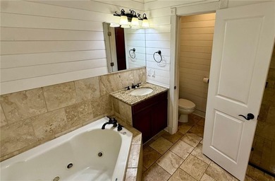 Welcome to an exceptional family retreat where luxury, lifestyle on Cypress Country Club and Golf Club  in Alabama - for sale on GolfHomes.com, golf home, golf lot