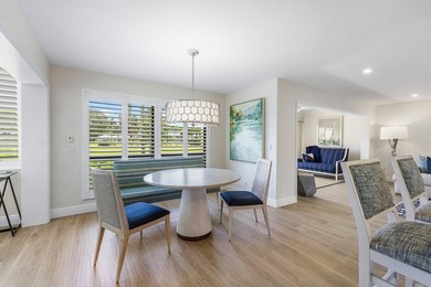 Experience the convenience of this renovated first-floor corner on Quail Ridge Golf Course and Country Club in Florida - for sale on GolfHomes.com, golf home, golf lot