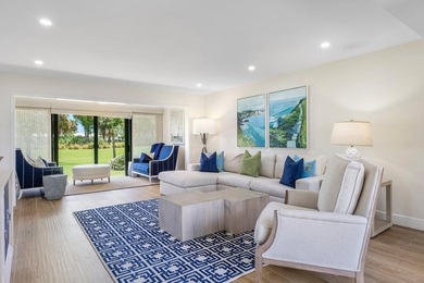 Experience the convenience of this renovated first-floor corner on Quail Ridge Golf Course and Country Club in Florida - for sale on GolfHomes.com, golf home, golf lot