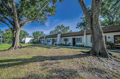 Lovely Highland Lakes villa located in Mission Grove. This villa on Highland Lakes Executive Golf Course in Florida - for sale on GolfHomes.com, golf home, golf lot