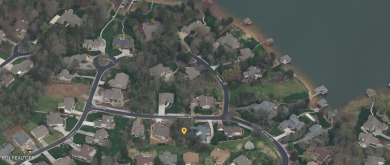 Located in the highly desirable area of Tanasi Shores, this home on Tanasi Golf Course in Tennessee - for sale on GolfHomes.com, golf home, golf lot