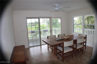 14112 CLUBHOUSE DR BOKEELIA FL 33922 IS A 2 LARGE BEDROOM 2 BATH on Alden Pines Golf Club in Florida - for sale on GolfHomes.com, golf home, golf lot