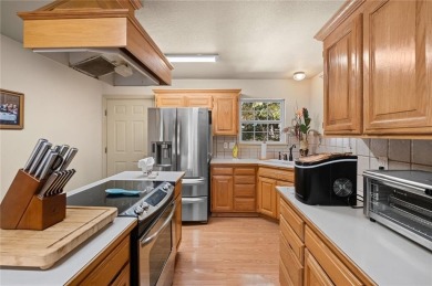 Escape to comfort and serenity at 14 Redruth Lane in beautiful on Bella Vista Country Club - Kingswood in Arkansas - for sale on GolfHomes.com, golf home, golf lot