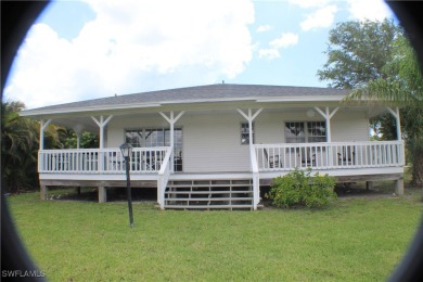 14112 CLUBHOUSE DR BOKEELIA FL 33922 IS A 2 LARGE BEDROOM 2 BATH on Alden Pines Golf Club in Florida - for sale on GolfHomes.com, golf home, golf lot