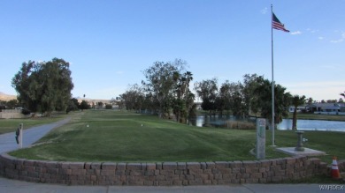 Easy access downstairs condo with patio view of pool and spa on Chaparral Golf and Country Club in Arizona - for sale on GolfHomes.com, golf home, golf lot