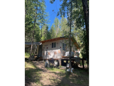 Since 1966, Jerry's Saloon has been a beloved retreat for locals on Meadow Creek Golf Course in Montana - for sale on GolfHomes.com, golf home, golf lot