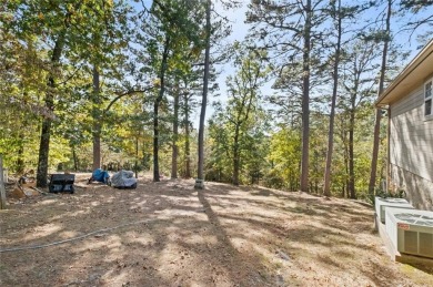 Escape to comfort and serenity at 14 Redruth Lane in beautiful on Bella Vista Country Club - Kingswood in Arkansas - for sale on GolfHomes.com, golf home, golf lot