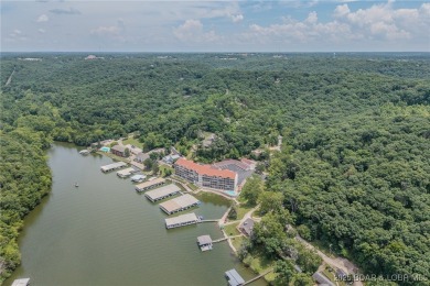 From Camdenton it's a 2-3 Minute Drive to this Pristine Lake on The Club At Old Kinderhook in Missouri - for sale on GolfHomes.com, golf home, golf lot