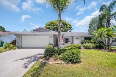Step into light and bright Florida living with this spacious on Highland Lakes Executive Golf Course in Florida - for sale on GolfHomes.com, golf home, golf lot