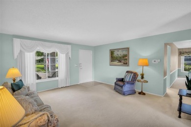 Step into light and bright Florida living with this spacious on Highland Lakes Executive Golf Course in Florida - for sale on GolfHomes.com, golf home, golf lot