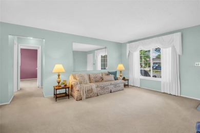 Step into light and bright Florida living with this spacious on Highland Lakes Executive Golf Course in Florida - for sale on GolfHomes.com, golf home, golf lot