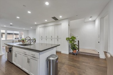 This contemporary three-story townhouse, oriented towards the on Mission Hills of Hayward Golf Course in California - for sale on GolfHomes.com, golf home, golf lot