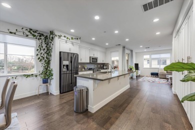 This contemporary three-story townhouse, oriented towards the on Mission Hills of Hayward Golf Course in California - for sale on GolfHomes.com, golf home, golf lot