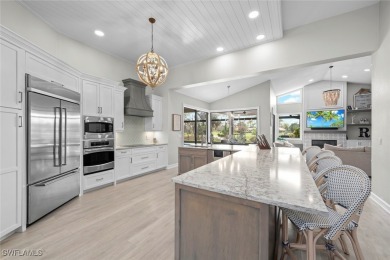 This exquisite 3-bedroom plus den, 3-bath home has been on Fiddlesticks Country Club in Florida - for sale on GolfHomes.com, golf home, golf lot