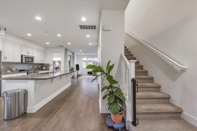 This contemporary three-story townhouse, oriented towards the on Mission Hills of Hayward Golf Course in California - for sale on GolfHomes.com, golf home, golf lot