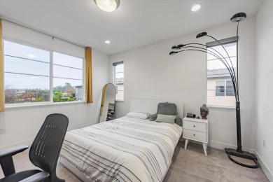 This contemporary three-story townhouse, oriented towards the on Mission Hills of Hayward Golf Course in California - for sale on GolfHomes.com, golf home, golf lot