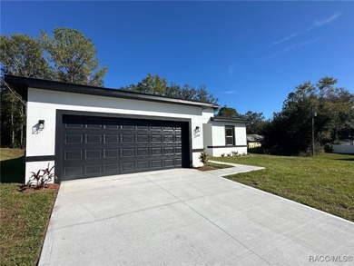 Welcome to this charming home on a corner lot home that sits up on Citrus Springs Country Club in Florida - for sale on GolfHomes.com, golf home, golf lot