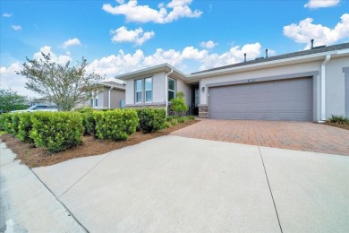 Why settle for a golf course view when you can live right on it? on Trilogy at Ocala Preserve in Florida - for sale on GolfHomes.com, golf home, golf lot