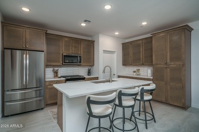 Enjoy a low-maintenance Active Adult lifestyle from this on Verrado Golf Club - Victory in Arizona - for sale on GolfHomes.com, golf home, golf lot