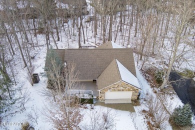 Nestled in the heart of Fairfield Glade North, this 2006-built on Heatherhurst Golf Course in Tennessee - for sale on GolfHomes.com, golf home, golf lot