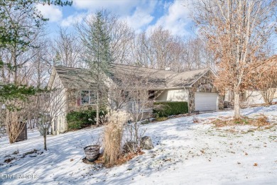 Nestled in the heart of Fairfield Glade North, this 2006-built on Heatherhurst Golf Course in Tennessee - for sale on GolfHomes.com, golf home, golf lot