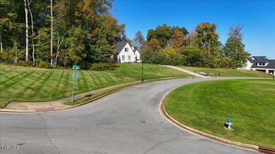 Enjoy over 1.94 acres overlooking the challenging 9th hole of on Ridges Golf and Country Club in Tennessee - for sale on GolfHomes.com, golf home, golf lot