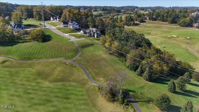 Enjoy over 1.94 acres overlooking the challenging 9th hole of on Ridges Golf and Country Club in Tennessee - for sale on GolfHomes.com, golf home, golf lot