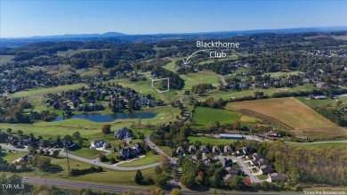 Enjoy over 1.94 acres overlooking the challenging 9th hole of on Ridges Golf and Country Club in Tennessee - for sale on GolfHomes.com, golf home, golf lot