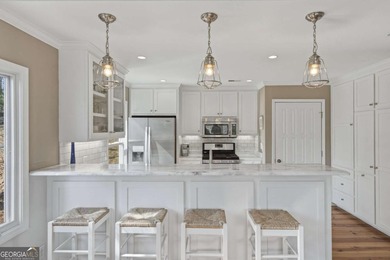 Welcome to the lake life! Nestled within the sought after on The Highlands Course at Lake Arrowhead in Georgia - for sale on GolfHomes.com, golf home, golf lot