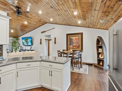 This modern, low-maintenance retreat is perfect for those who on Breezy Point Golf Course Resort in Minnesota - for sale on GolfHomes.com, golf home, golf lot