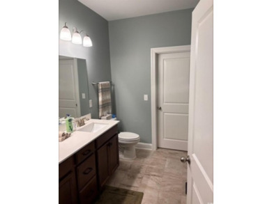 Experience coastal living in this stunning 5 bedroom 3.5 bath on Barefoot Resort and Golf Club  in South Carolina - for sale on GolfHomes.com, golf home, golf lot