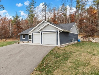 This modern, low-maintenance retreat is perfect for those who on Breezy Point Golf Course Resort in Minnesota - for sale on GolfHomes.com, golf home, golf lot