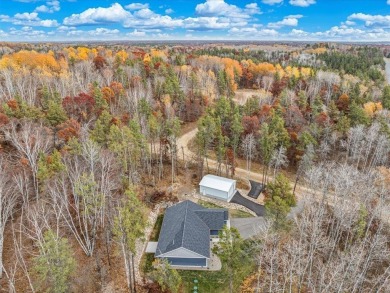 This modern, low-maintenance retreat is perfect for those who on Breezy Point Golf Course Resort in Minnesota - for sale on GolfHomes.com, golf home, golf lot