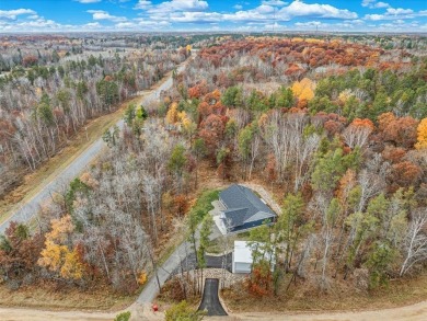 This modern, low-maintenance retreat is perfect for those who on Breezy Point Golf Course Resort in Minnesota - for sale on GolfHomes.com, golf home, golf lot