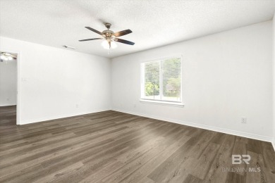 This remodeled 3-bedroom, 2-bath brick home is centrally located on Lake Forest Yacht and Country Club in Alabama - for sale on GolfHomes.com, golf home, golf lot