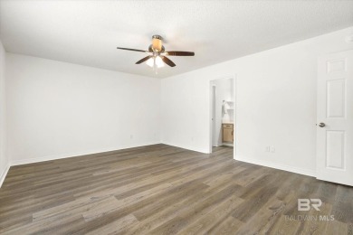 This remodeled 3-bedroom, 2-bath brick home is centrally located on Lake Forest Yacht and Country Club in Alabama - for sale on GolfHomes.com, golf home, golf lot