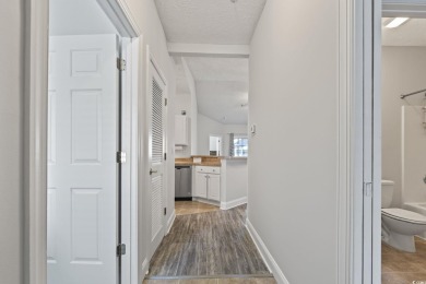 Welcome to 4935 Crab Pond Ct Unit 202 a stunning 3-bedroom on Mystical Golf Man O War Golf Links in South Carolina - for sale on GolfHomes.com, golf home, golf lot