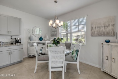 You'll love coming home to this stunning 2023-built waterfront on Venetian Bay Golf Course in Florida - for sale on GolfHomes.com, golf home, golf lot