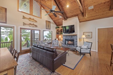 Experience breathtaking lake views from this charming 3-bedroom on The Golf Club at Cuscowilla in Georgia - for sale on GolfHomes.com, golf home, golf lot