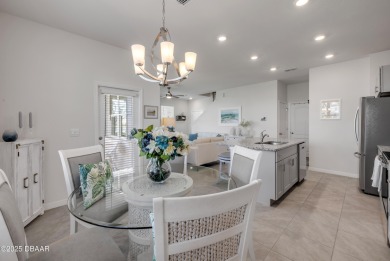 You'll love coming home to this stunning 2023-built waterfront on Venetian Bay Golf Course in Florida - for sale on GolfHomes.com, golf home, golf lot
