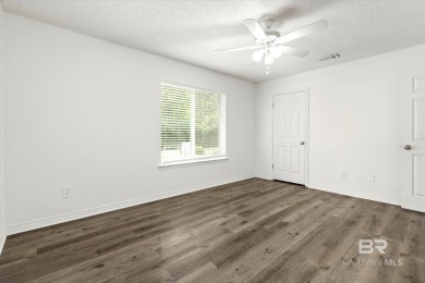 This remodeled 3-bedroom, 2-bath brick home is centrally located on Lake Forest Yacht and Country Club in Alabama - for sale on GolfHomes.com, golf home, golf lot