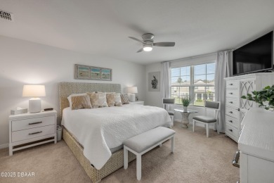 You'll love coming home to this stunning 2023-built waterfront on Venetian Bay Golf Course in Florida - for sale on GolfHomes.com, golf home, golf lot