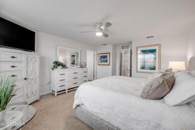You'll love coming home to this stunning 2023-built waterfront on Venetian Bay Golf Course in Florida - for sale on GolfHomes.com, golf home, golf lot