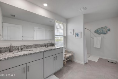 You'll love coming home to this stunning 2023-built waterfront on Venetian Bay Golf Course in Florida - for sale on GolfHomes.com, golf home, golf lot
