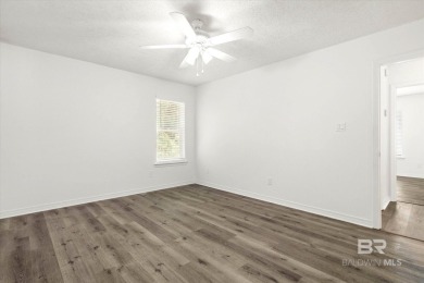 This remodeled 3-bedroom, 2-bath brick home is centrally located on Lake Forest Yacht and Country Club in Alabama - for sale on GolfHomes.com, golf home, golf lot