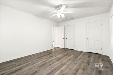 This remodeled 3-bedroom, 2-bath brick home is centrally located on Lake Forest Yacht and Country Club in Alabama - for sale on GolfHomes.com, golf home, golf lot