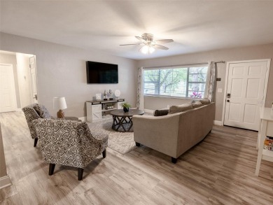 Welcome to this beautifully updated 4-bedroom, 3-bathroom home on Babe Zaharias Golf Course in Florida - for sale on GolfHomes.com, golf home, golf lot