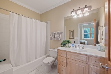 Experience breathtaking lake views from this charming 3-bedroom on The Golf Club at Cuscowilla in Georgia - for sale on GolfHomes.com, golf home, golf lot