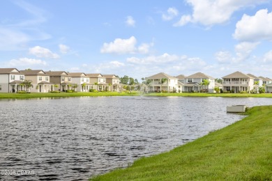 You'll love coming home to this stunning 2023-built waterfront on Venetian Bay Golf Course in Florida - for sale on GolfHomes.com, golf home, golf lot